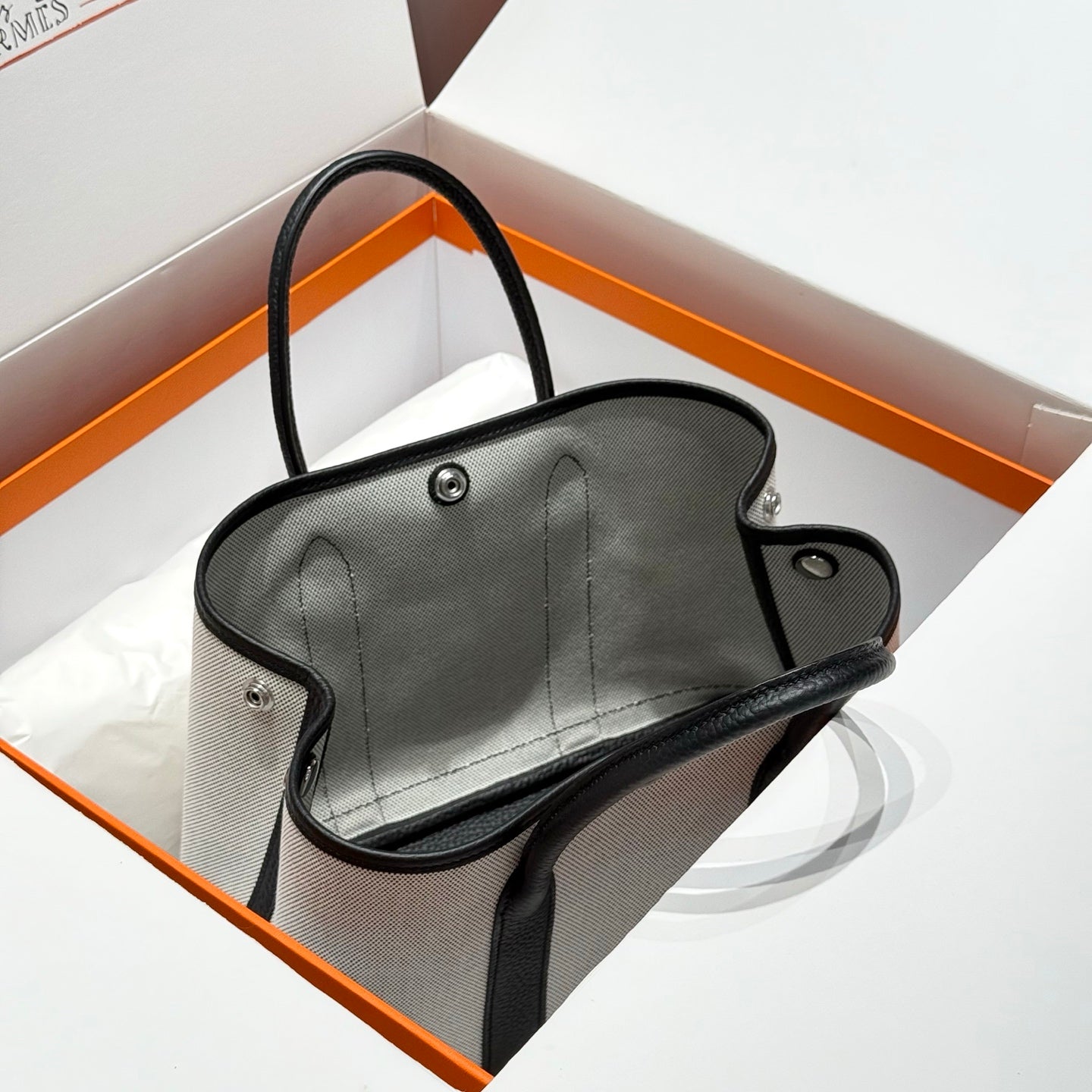HERMES GARDEN PARTY 30CM IN WHITE TOILETS COTTON CANVAS AND BLACK CALFSKIN
