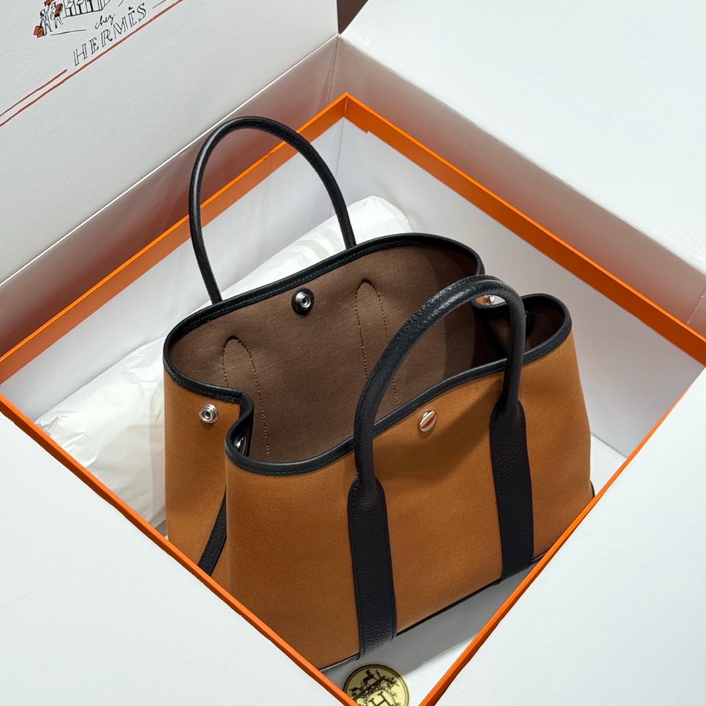 HERMES GARDEN PARTY 30CM IN ORANGE MINIMUM TOILETS COTTON CANVAS AND BLACK CALFSKIN