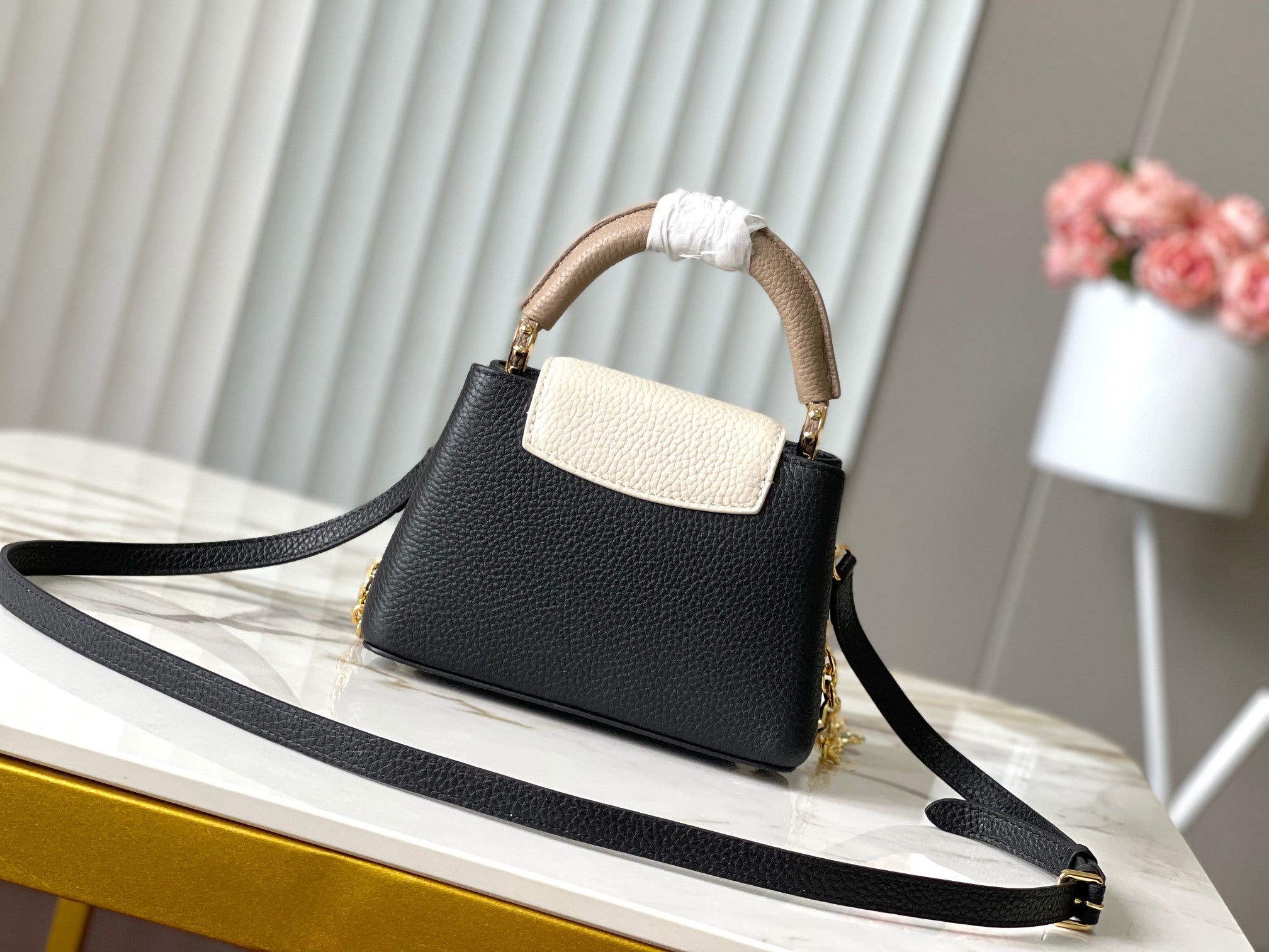 LOUIS VUITTON CAPUCINES MINI 21 IN BLACK MIX WHITE TAURILLON GOLD HARDWARE