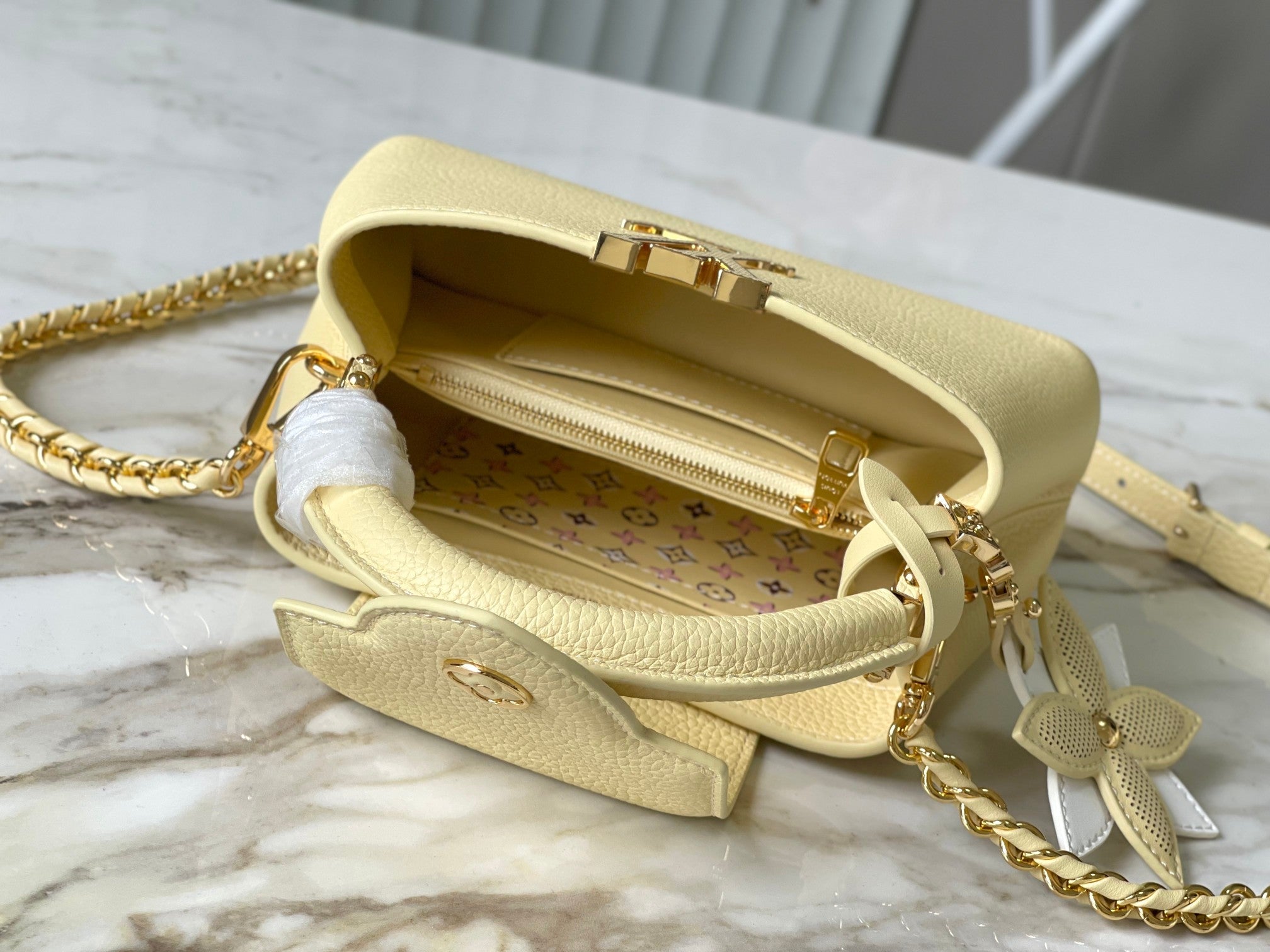 LOUIS VUITTON CAPUCINES EAST-WEST MINI 22 IN BANANA YELLOW TAURILLON GOLD HARDWARE