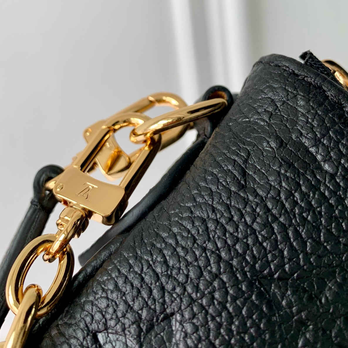 LOUIS VUITTON LIV POCHETTE BAG 24 IN BLACK MONOGRAM EMPREINTE LEATHER