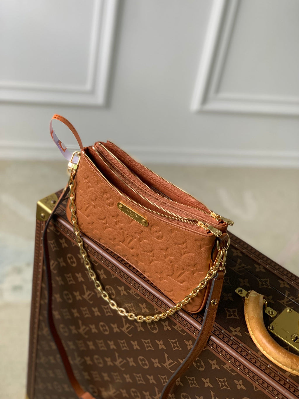 LOUIS VUITTON LIV POCHETTE BAG 24 IN COGNAC BROWN MONOGRAM EMPREINTE LEATHER