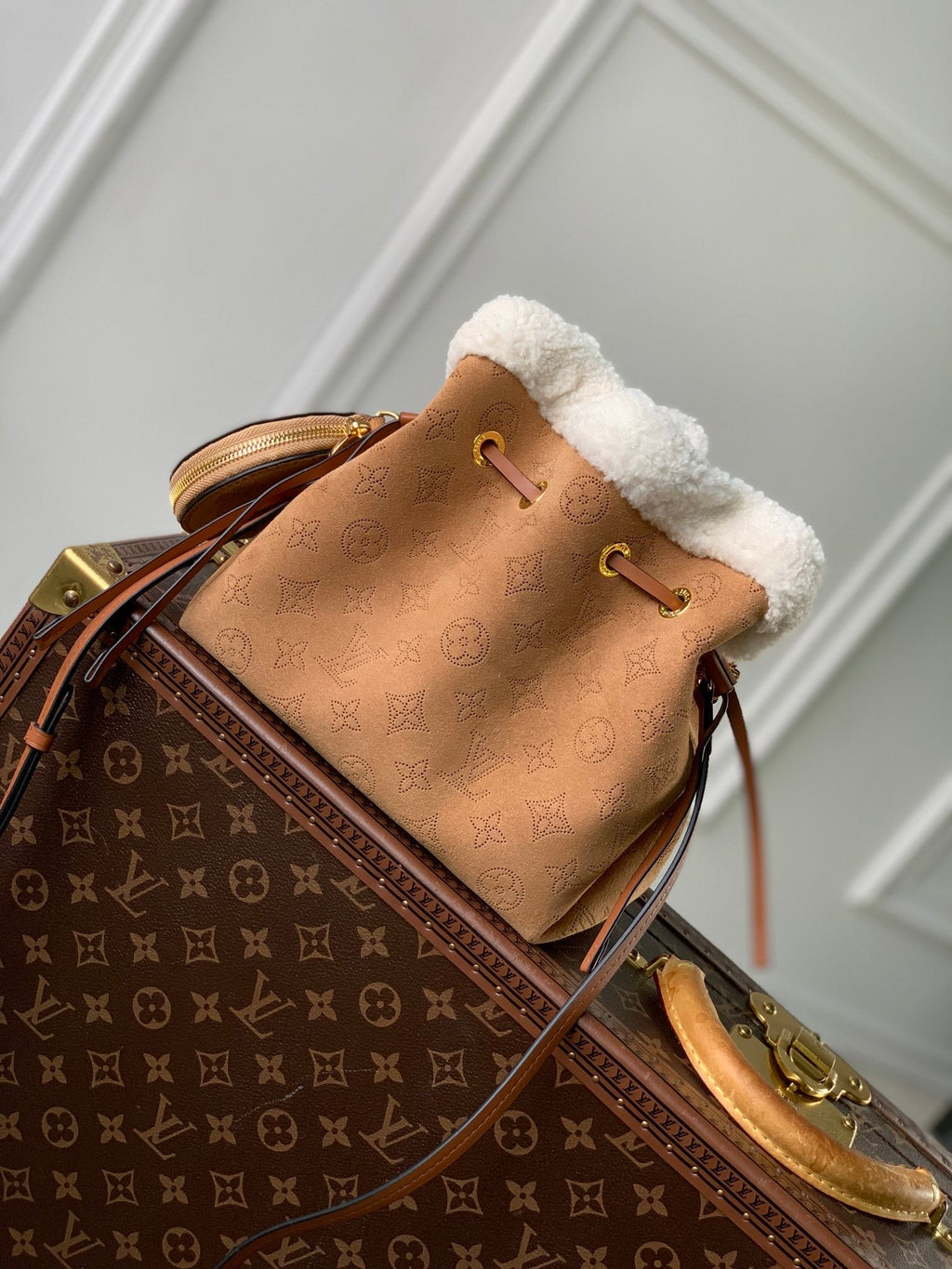 LOUIS VUITTON BELLA 22 IN CINNAMON BROWN MONOGRAM PERFORATED SUEDE AND WHITE SHEARLING TRIM
