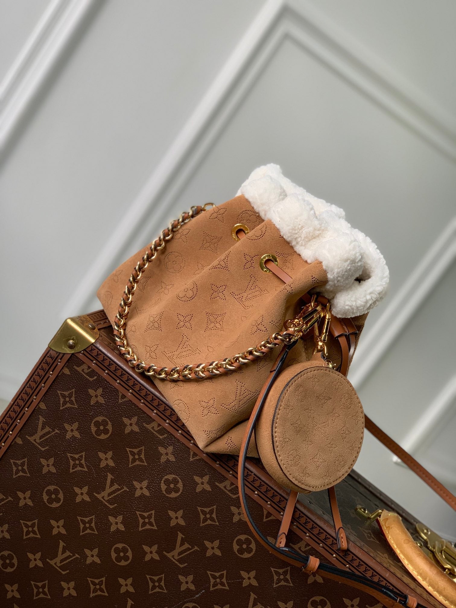 LOUIS VUITTON BELLA 22 IN CINNAMON BROWN MONOGRAM PERFORATED SUEDE AND WHITE SHEARLING TRIM