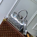 LOUIS VUITTON SPEEDY BANDOULIÈRE 20 IN SILVER MONOGRAM EMBOSSED CALFSKIN