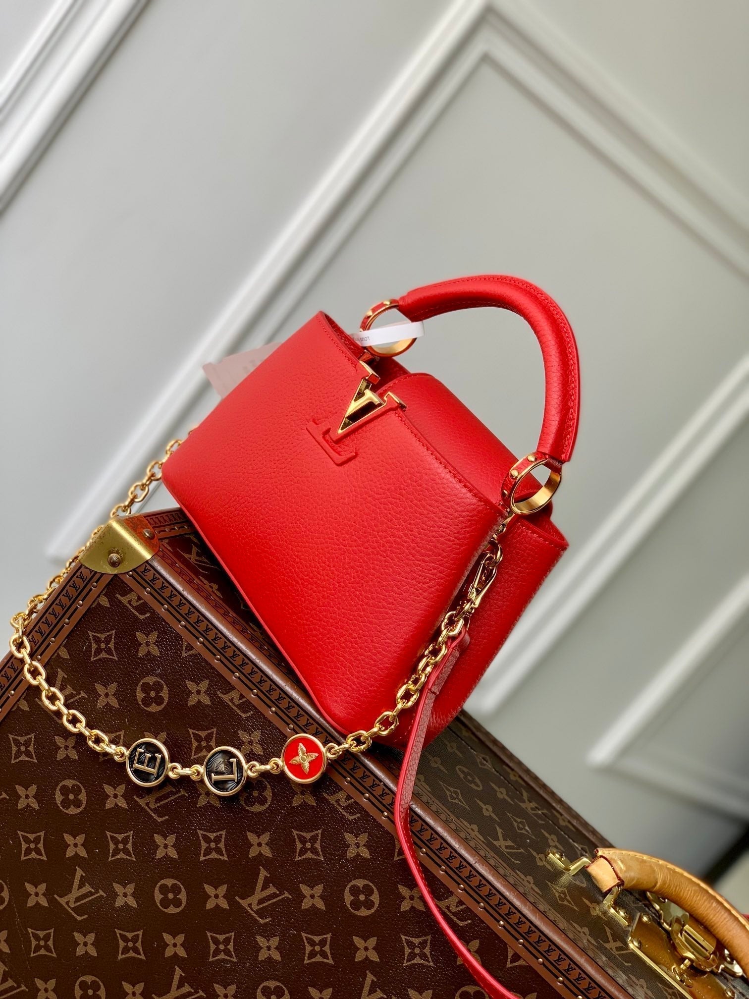 LOUIS VUITTON CAPUCINES MINI 23 IN RED TAURILLON GOLD HARDWARE