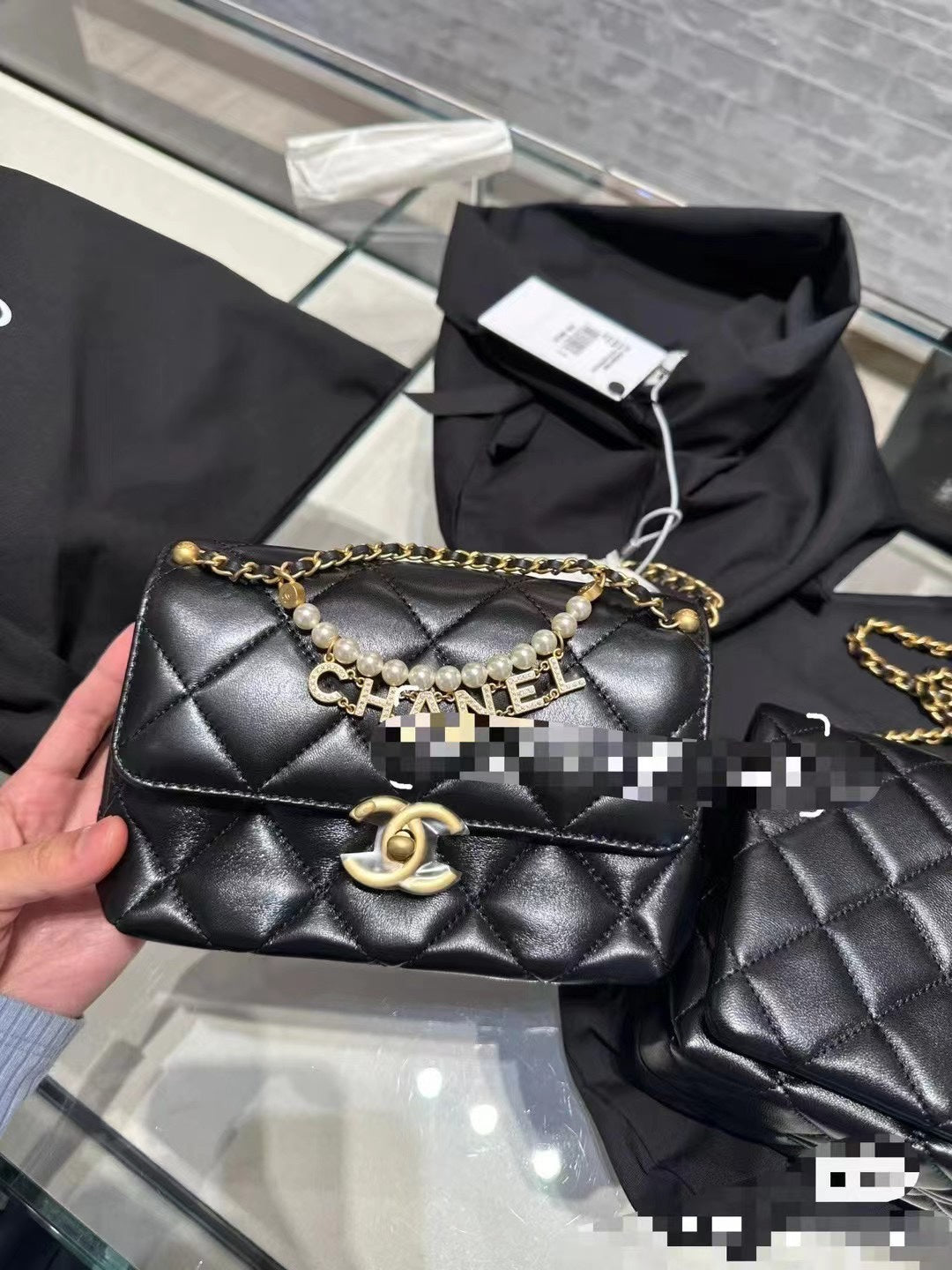 CHANEL MINI 22 FLAP BAG IN BLACK CALFSKIN GOLD HARDWARE WITH PEARL CHAIN