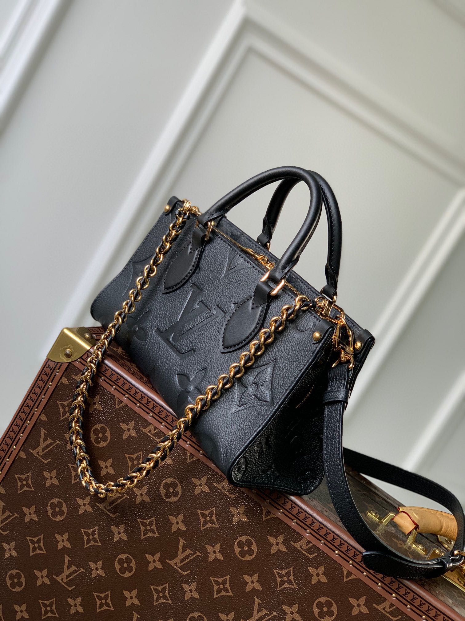 LOUIS VUITTON ONTHEGO EAST WEST BAG 25 IN BLACK MONOGRAM EMBOSSED COWHIDE