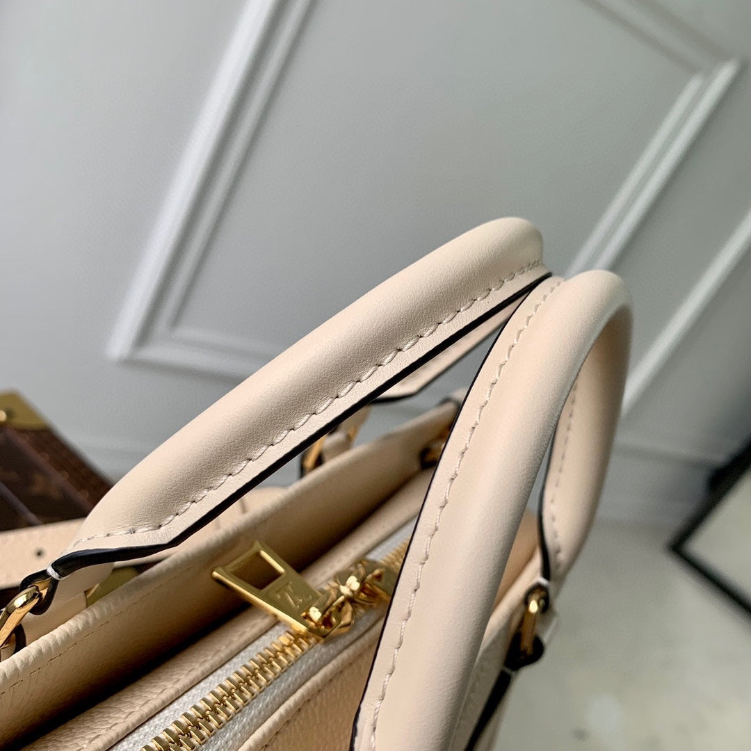 LOUIS VUITTON ONTHEGO EAST WEST BAG 25 IN BEIGE MONOGRAM EMBOSSED COWHIDE