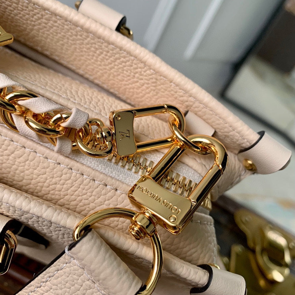 LOUIS VUITTON ONTHEGO EAST WEST BAG 25 IN BEIGE MONOGRAM EMBOSSED COWHIDE