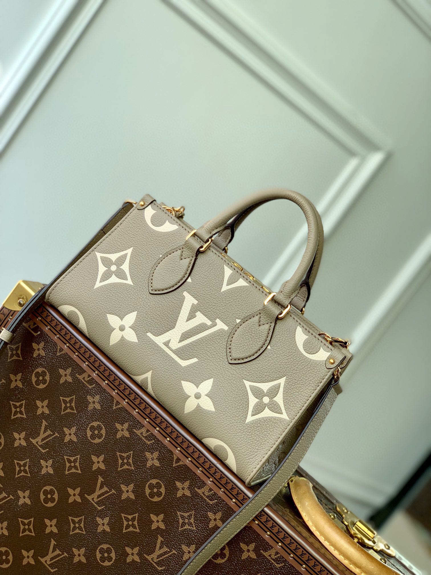 LOUIS VUITTON ONTHEGO EAST WEST BAG 25 IN GREEN MONOGRAM EMBOSSED COWHIDE