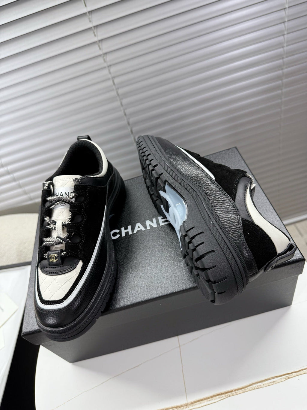 CHANEL 25S SNEAKERS 35MM IN BLACK AND WHITE CALFSKIN
