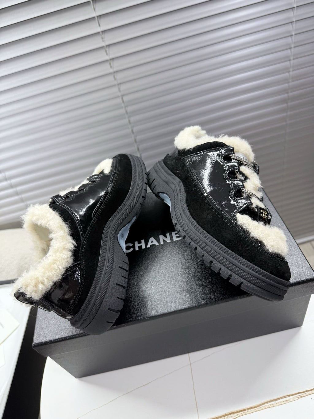 CHANEL 25S SNEAKERS WITH FUR AENTS 35MM IN BLACK CALFSKIN