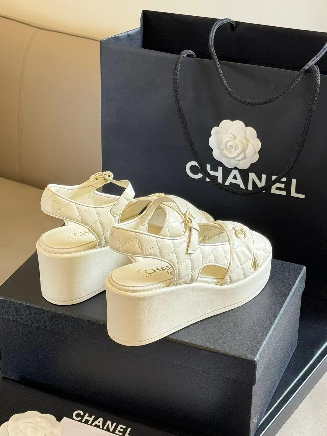 CHANEL CLASSIC WEDGE SANDALS IN WHITE LAMBSKIN