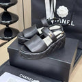 CHANEL HIGH WEDGE SANDALS IN BLACK LAMBSKIN