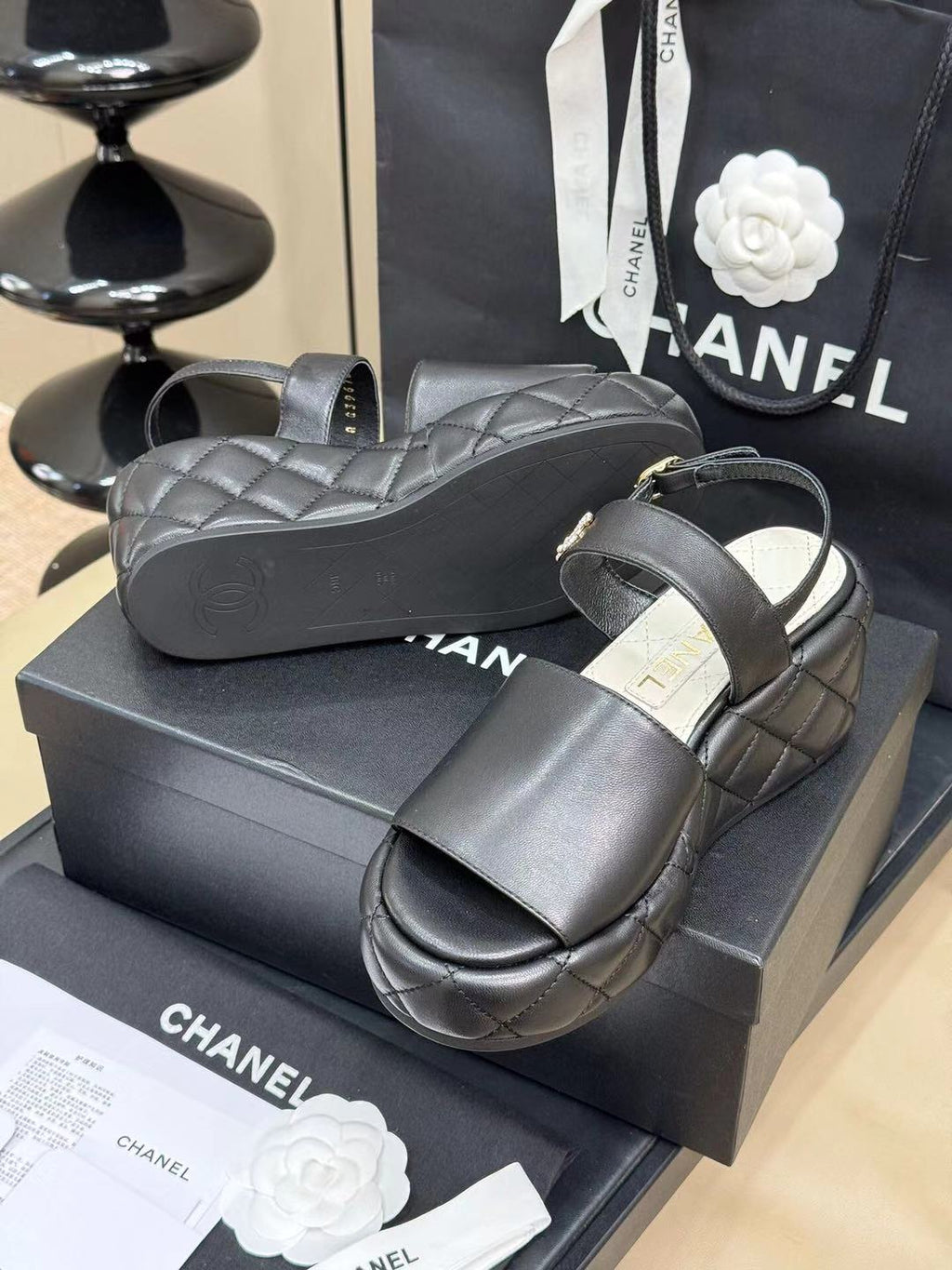 CHANEL HIGH WEDGE SANDALS IN BLACK LAMBSKIN