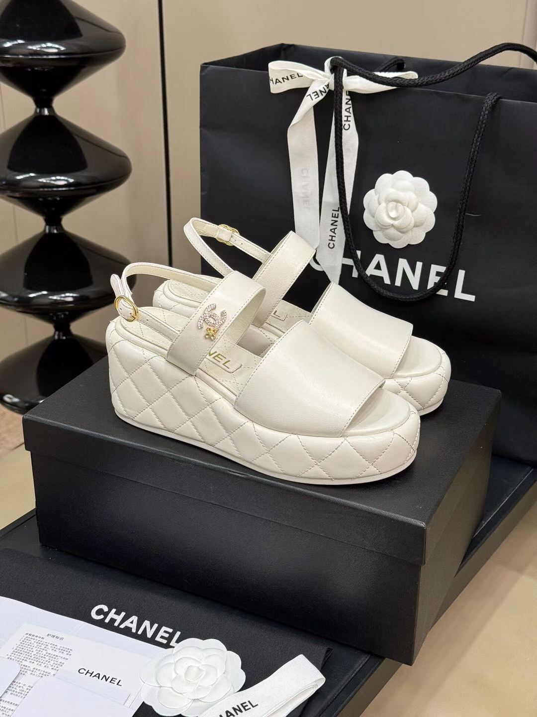 CHANEL HIGH WEDGE SANDALS IN WHITE LAMBSKIN