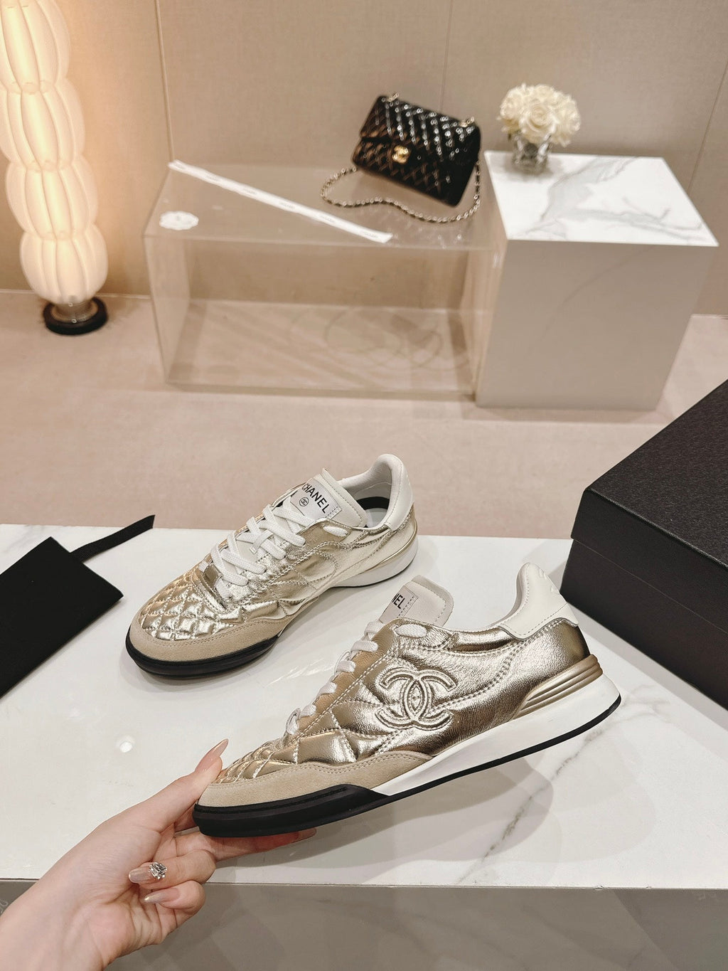 CHANEL SNEAKERS IN GLOSSY GOLDEN LAMBSKIN