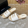 CHANEL PLATFORM SLIPPERS IN WHITE TWEED AND LAMBSKIN