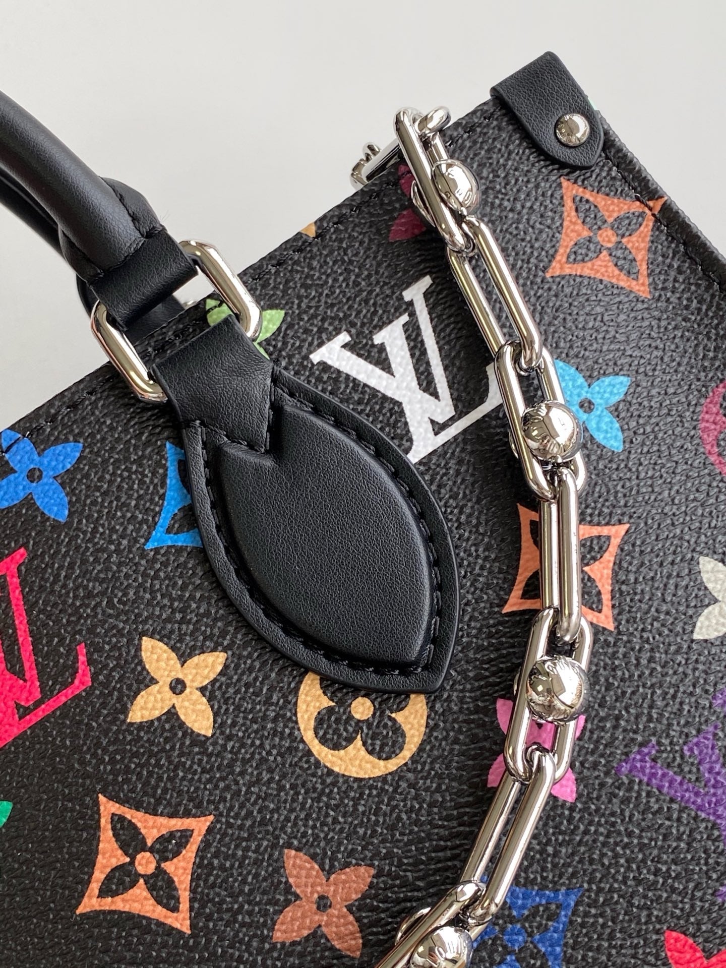LOUIS VUITTON ONTHEGO EAST WEST BAG 25 IN COLORFUL MONOGRAM PATTERN CANVAS
