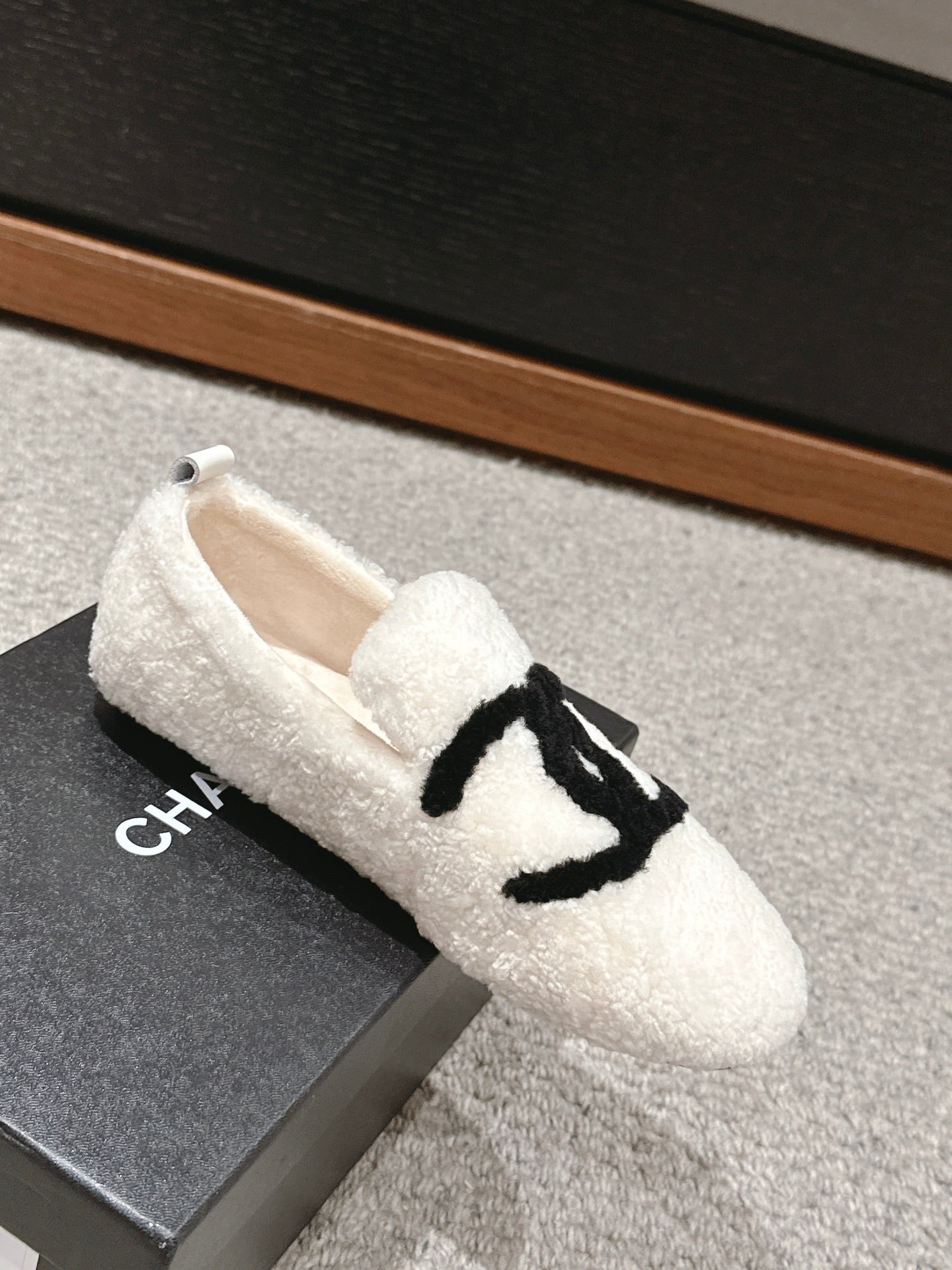 CHANEL LOAFERS IN WHITE FLEECE WITH BLACK LOGO