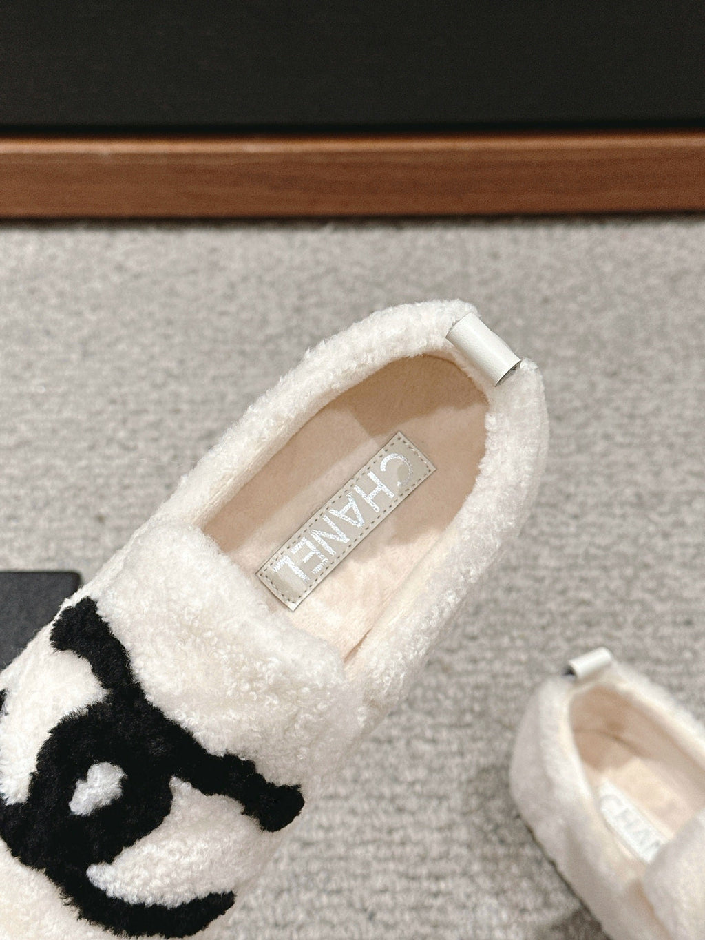 CHANEL LOAFERS IN WHITE FLEECE WITH BLACK LOGO