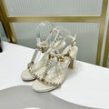 CHANEL HIGH HEELS PEARL CHAIN IN WHITE COWHIDE