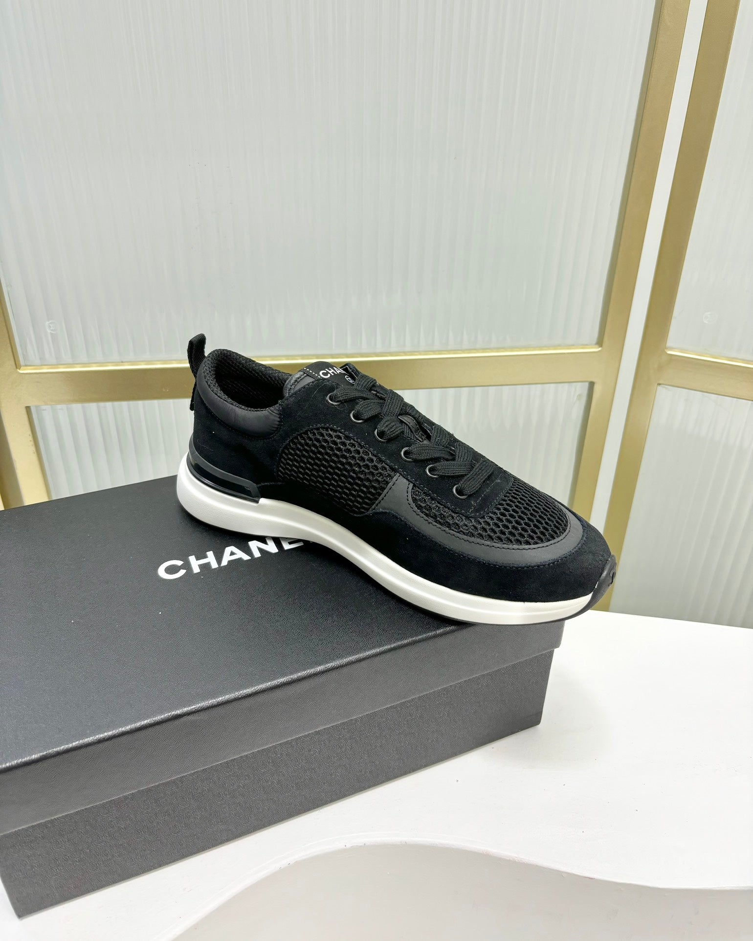 CHANEL SNEAKER IN BLACK SUEDE AND BREATHABLE MESH