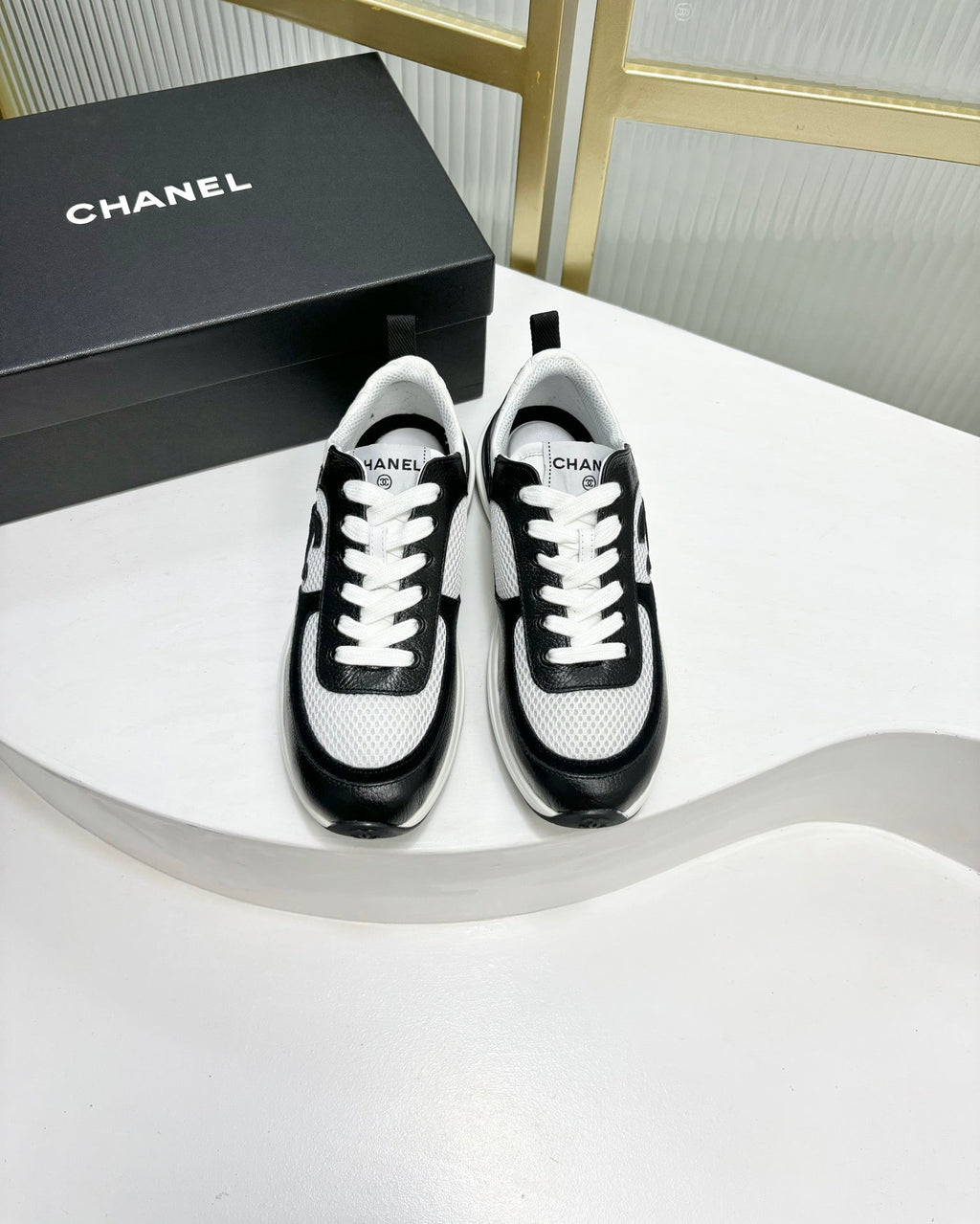 CHANEL SNEAKER IN BLACK CALFSKIN AND GREY BREATHABLE MESH