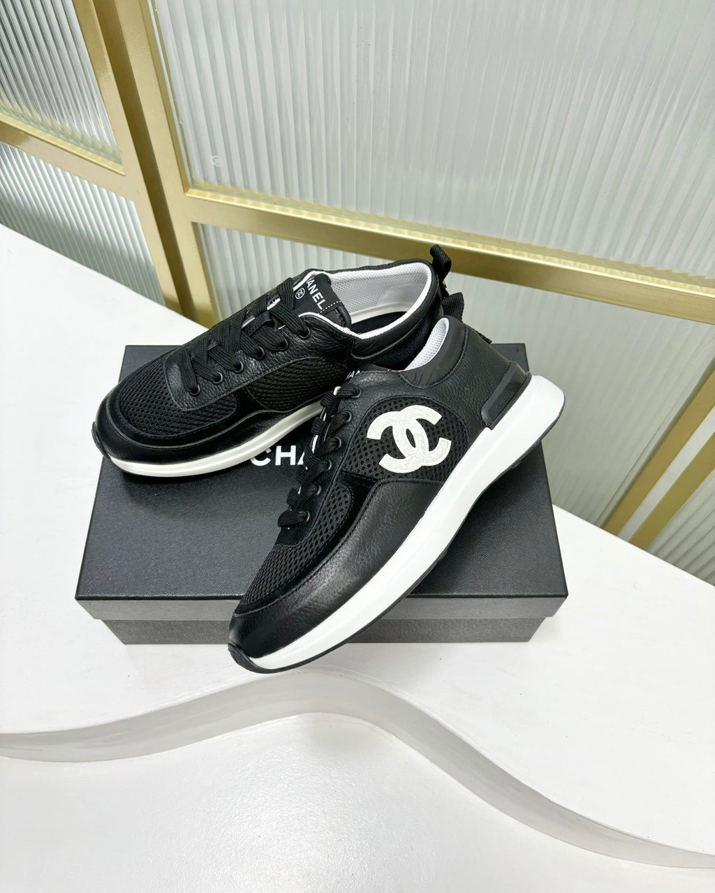 CHANEL SNEAKER IN BLACK SUEDE WITH WHITE LOGO