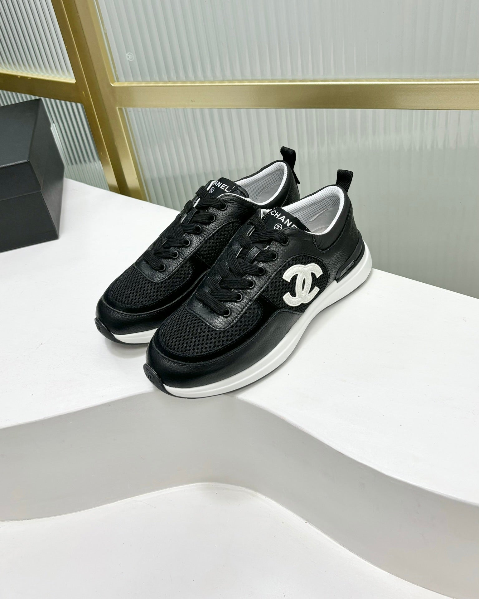 CHANEL SNEAKER IN BLACK SUEDE WITH WHITE LOGO