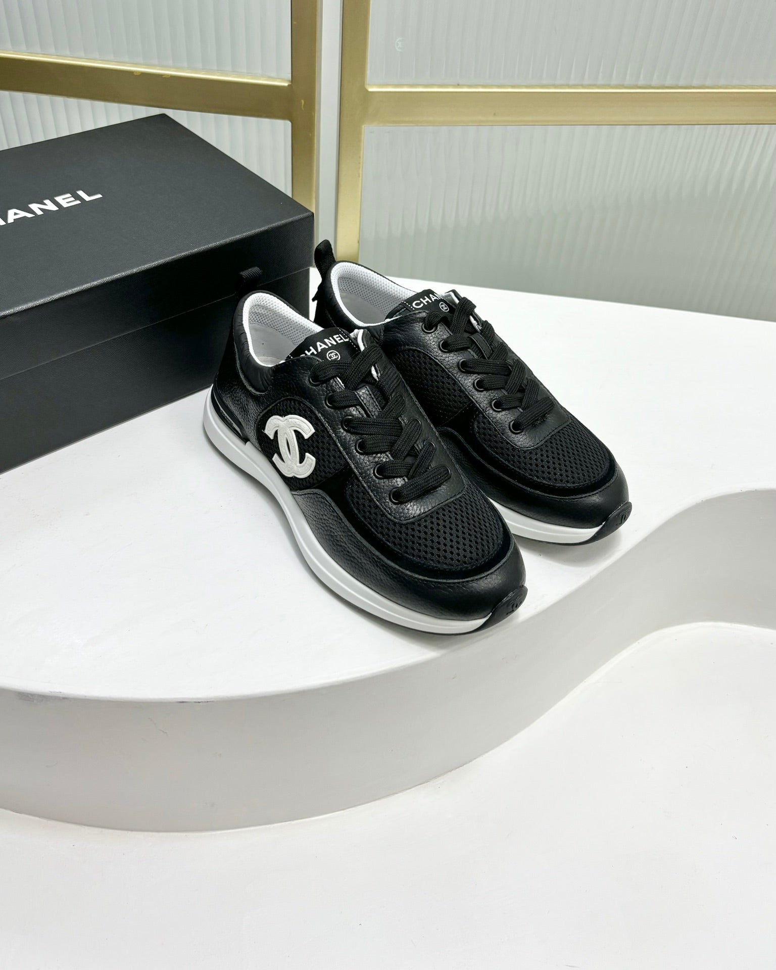 CHANEL SNEAKER IN BLACK SUEDE WITH WHITE LOGO