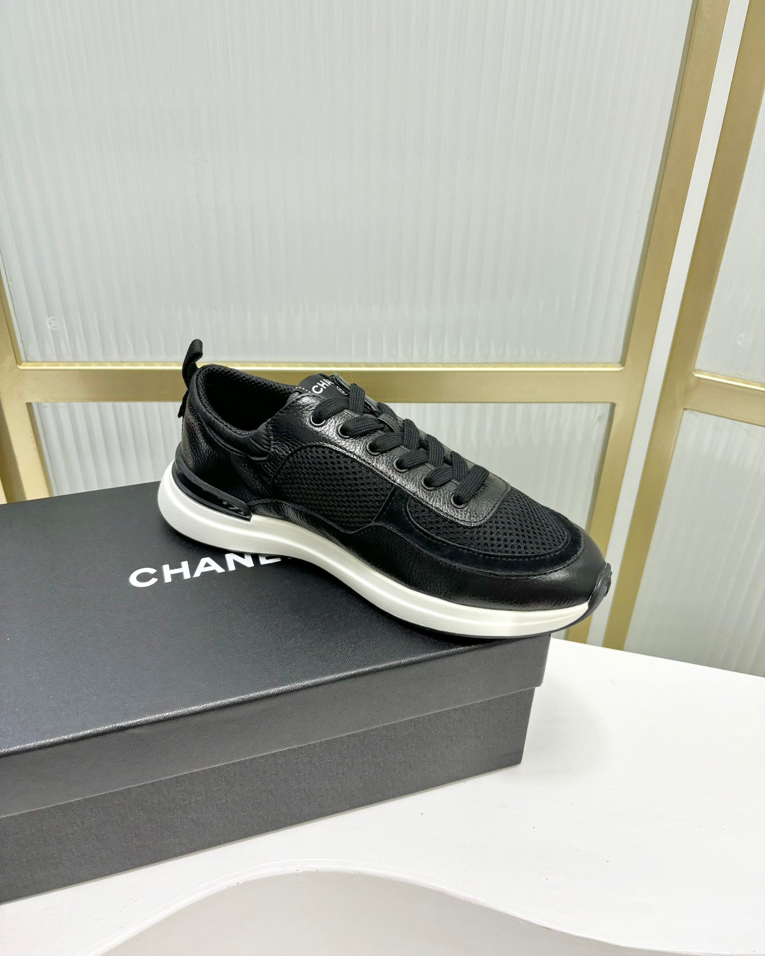 CHANEL SNEAKER IN BLACK SUEDE