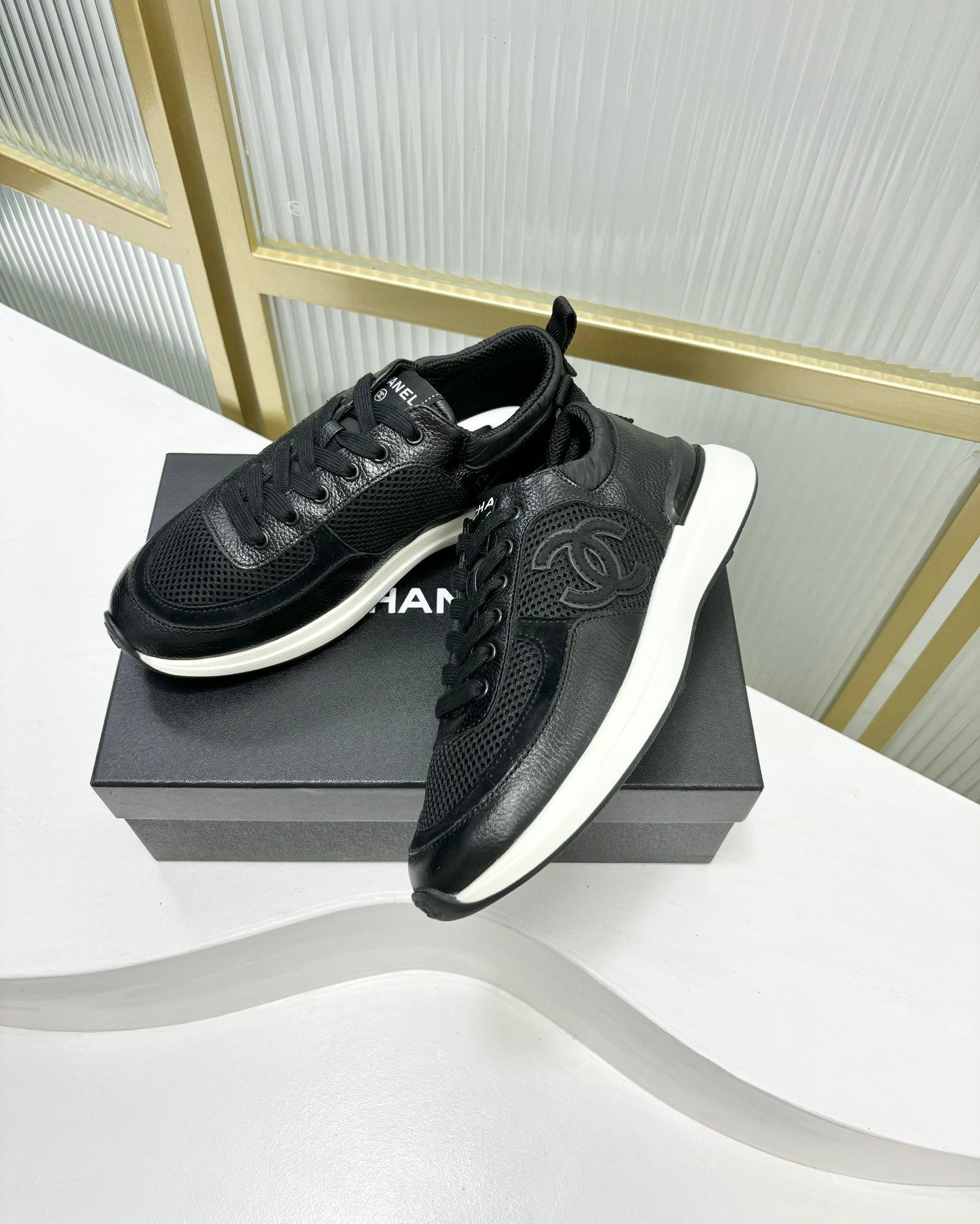 CHANEL SNEAKER IN BLACK SUEDE