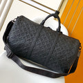 LOUIS VUITTON LV 25S KEEPALL BANDOULIÈRE BAG 50 IN BLACK EMBOSSED TAURILLON CALFSKIN MONOGRAM