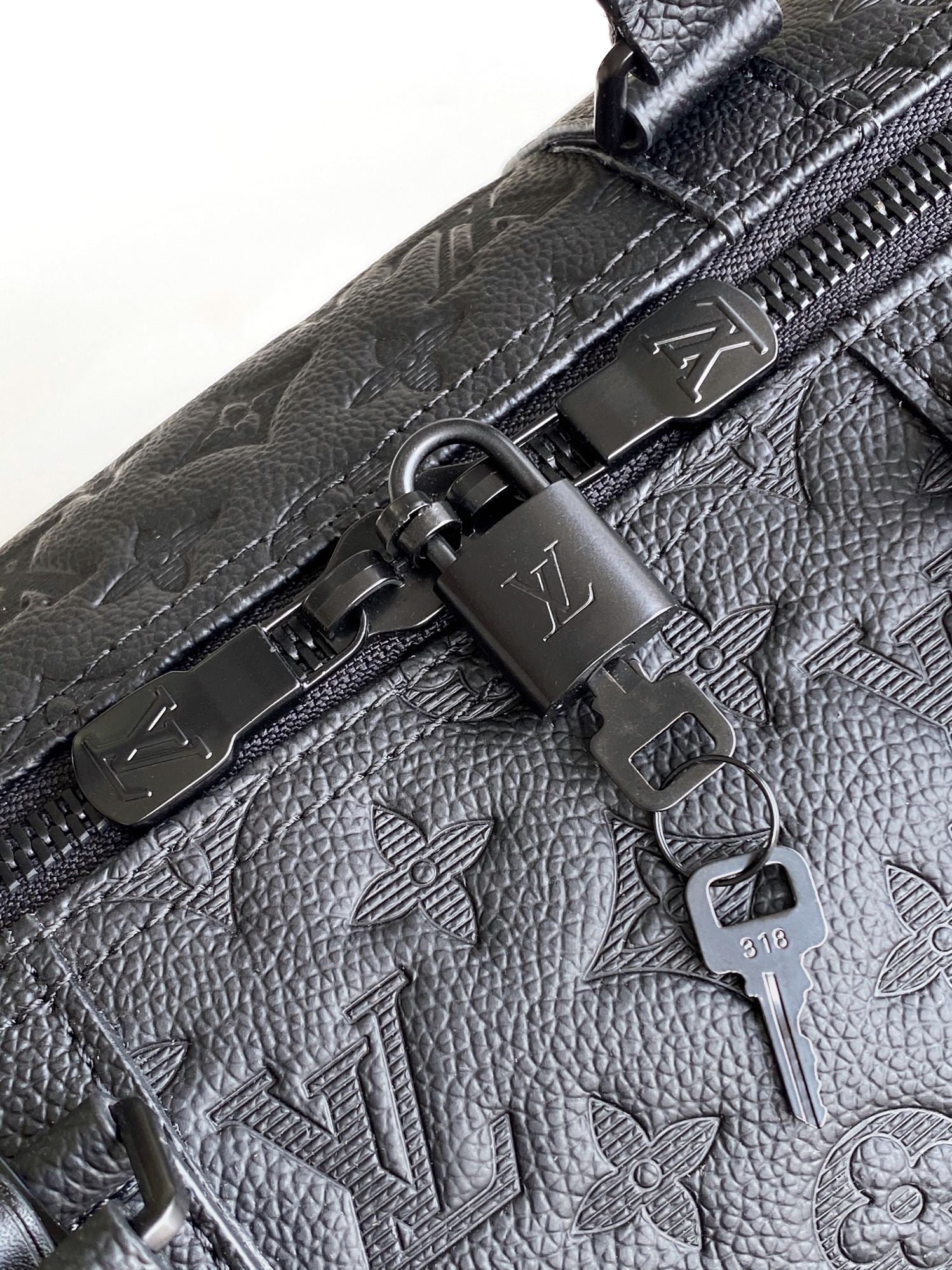 LOUIS VUITTON LV 25S KEEPALL BANDOULIÈRE BAG 50 IN BLACK EMBOSSED TAURILLON CALFSKIN MONOGRAM