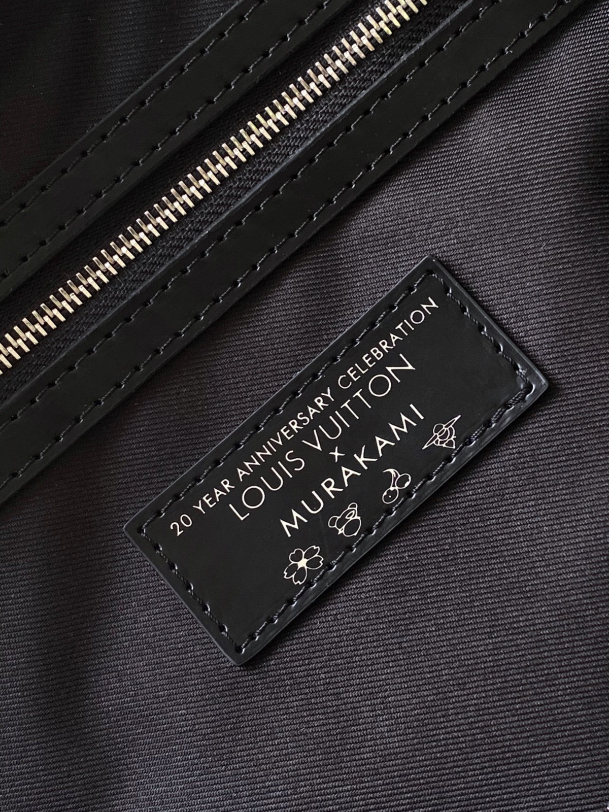 LOUIS VUITTON KEEPALL BANDOULIÈRE 50 BAG IN MULTICOLORED MONOGRAM COATED CANVAS
