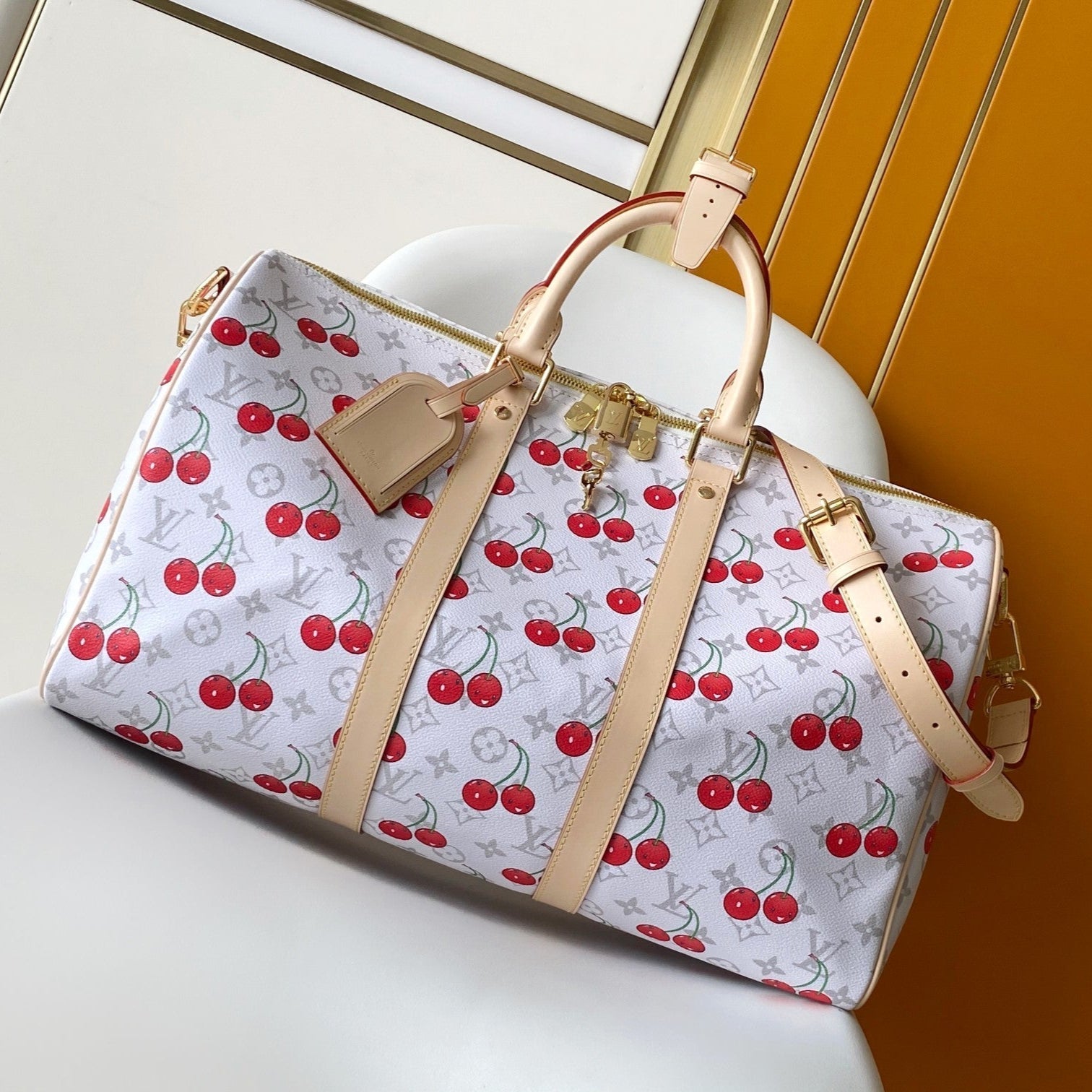 LOUIS VUITTON KEEPALL BANDOULIÈRE 45 IN WHITE AND RED CALFSKIN