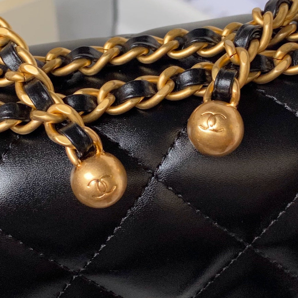 CHANEL FLAP BAG 22 IN BLACK CALFSKIN WITH DOUBLE GOLD BALL