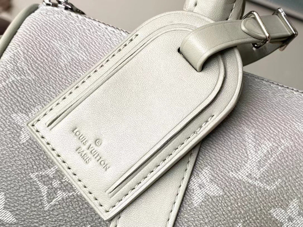 LOUIS VUITTON KEEPALL BANDOULIÈRE 25 IN GRAY MONOGRAM GRADIENT CANVAS