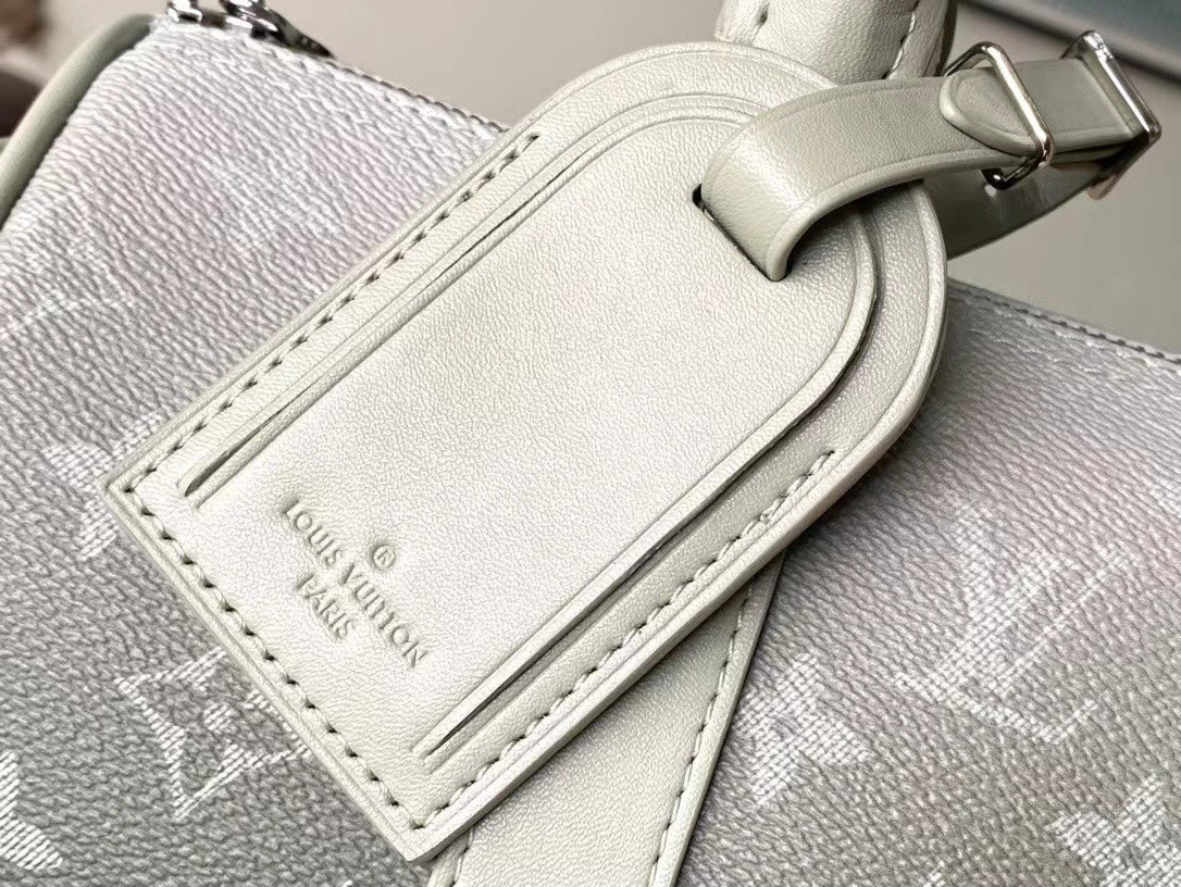 LOUIS VUITTON KEEPALL BANDOULIÈRE 25 IN GRAY MONOGRAM GRADIENT CANVAS