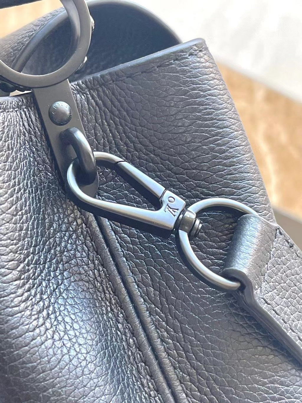 LOUIS VUITTON CAPUCINES EAST-WEST MINI 21 IN BLACK TAURILLON