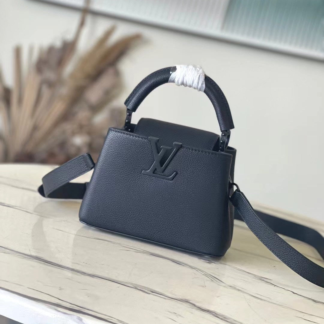 LOUIS VUITTON CAPUCINES EAST-WEST MINI 21 IN BLACK TAURILLON