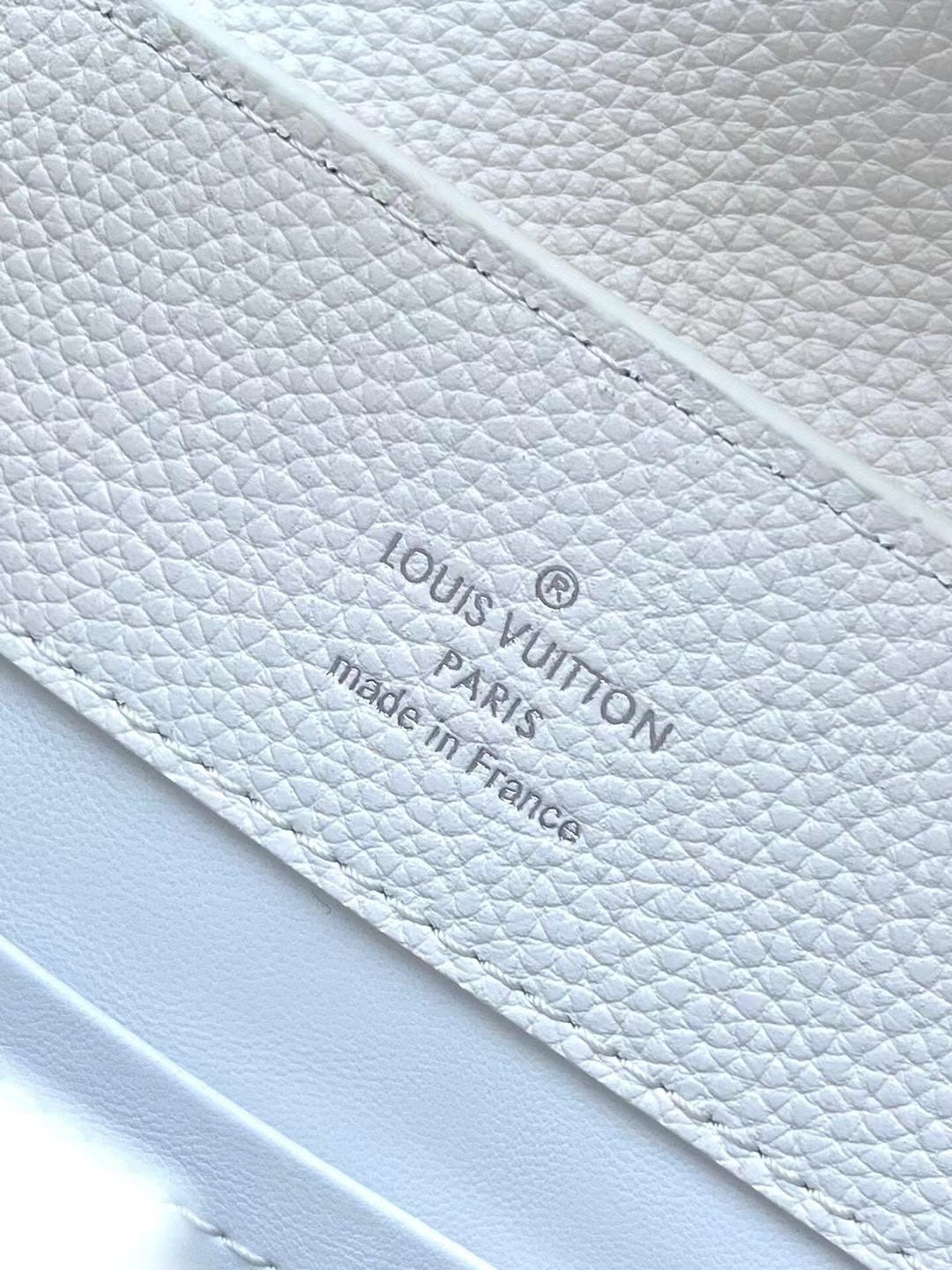 LOUIS VUITTON CAPUCINES EAST-WEST BB 27 IN WHITE TAURILLON
