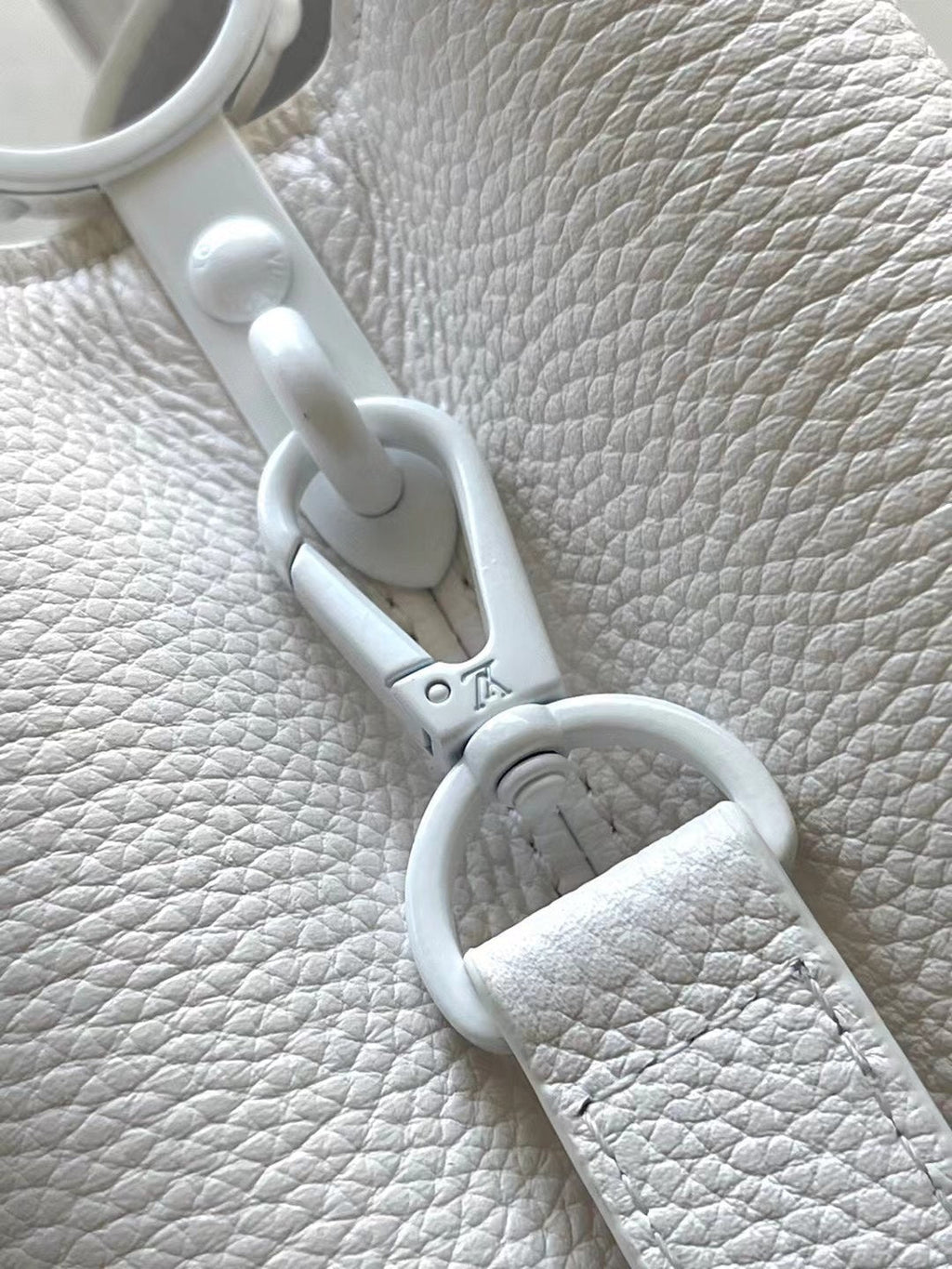 LOUIS VUITTON CAPUCINES EAST-WEST BB 27 IN WHITE TAURILLON