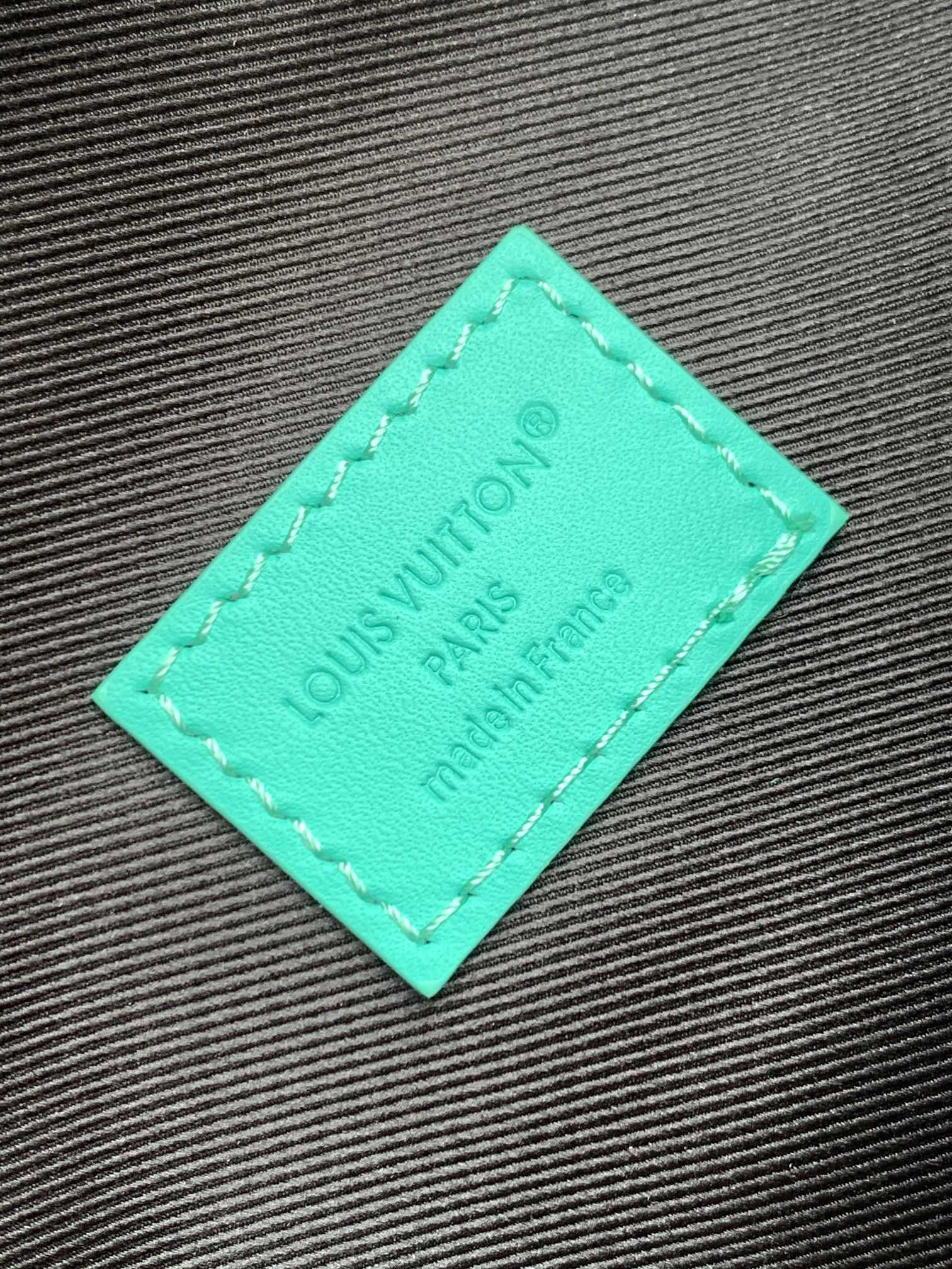 LOUIS VUITTON LV 25S DISCOVERY BUMBAG 44 IN BLACK AQUA MONOGRAM ECLIPSE CANVAS AND CALFSKIN