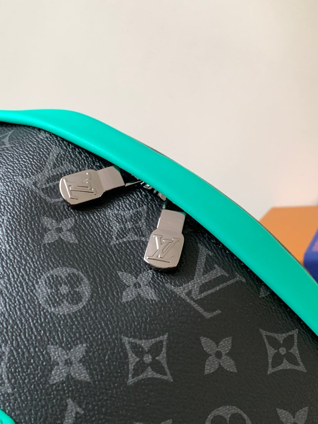 LOUIS VUITTON LV 25S DISCOVERY BUMBAG 44 IN BLACK AQUA MONOGRAM ECLIPSE CANVAS AND CALFSKIN