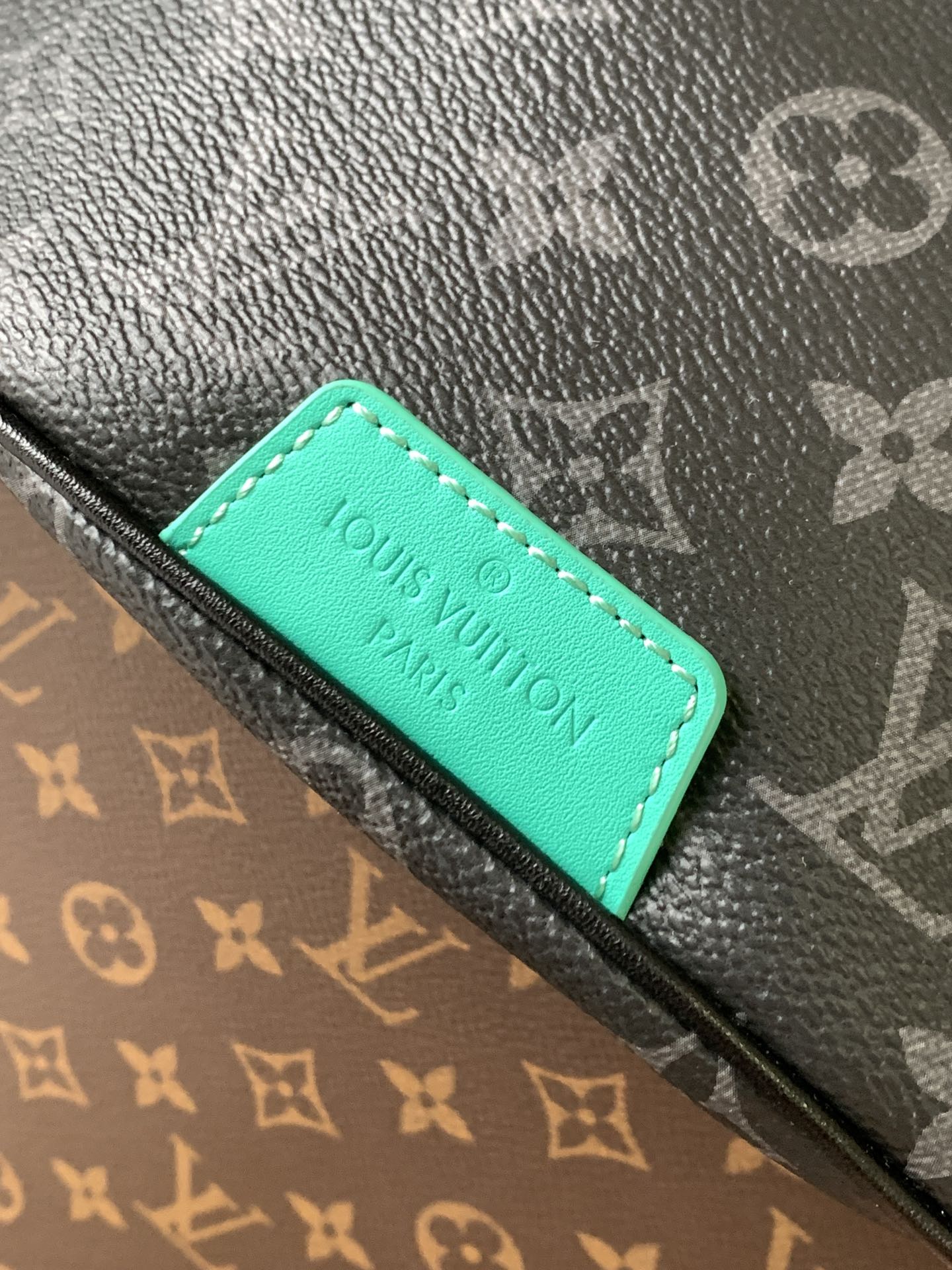 LOUIS VUITTON LV 25S DISCOVERY BUMBAG 44 IN BLACK AQUA MONOGRAM ECLIPSE CANVAS AND CALFSKIN