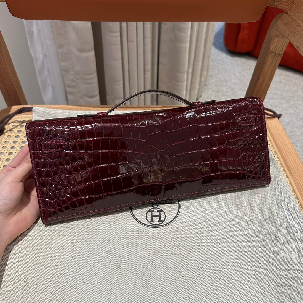 HERMES KELLY CUT 31 IN SANGRIA PURPLE ALLIGATOR LEATHER WITH GOLD HARDWARE