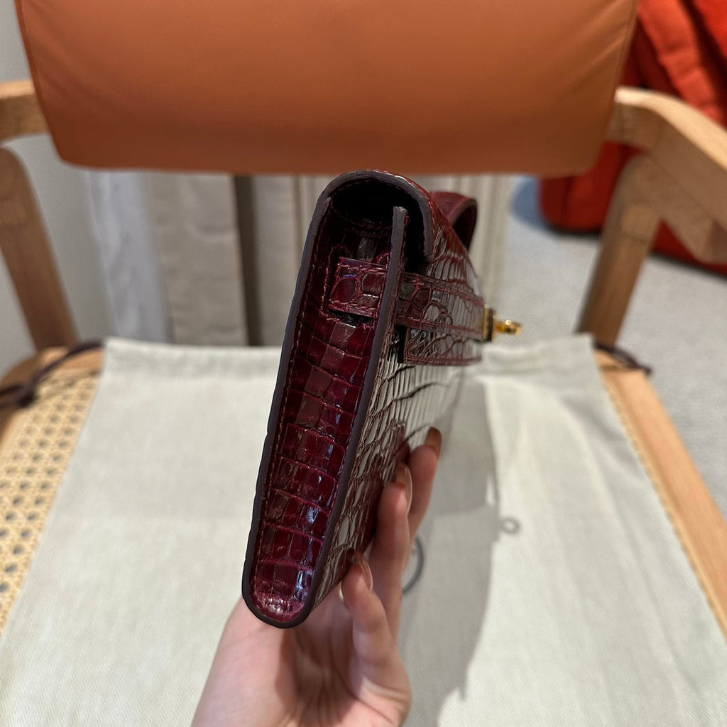 HERMES KELLY CUT 31 IN SANGRIA PURPLE ALLIGATOR LEATHER WITH GOLD HARDWARE